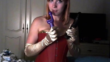 Submissive redhead cosplayer Julianna Cavalli in wonder woman outfit